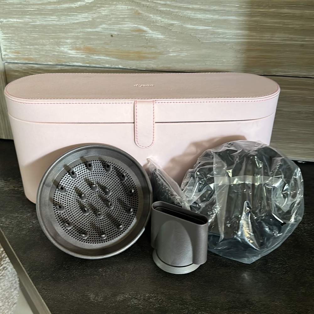 Dyson Pink Hair dryer with attachments